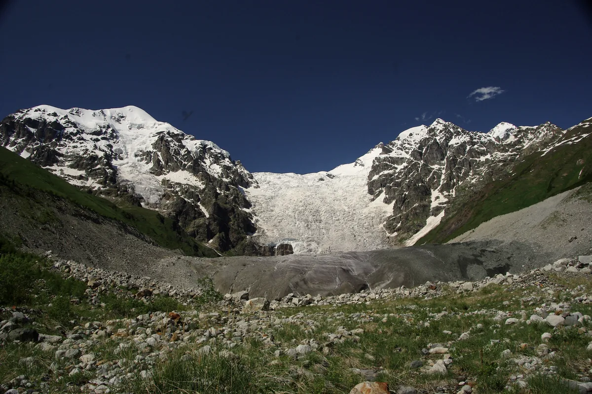 The Adishi glacier above the trail between Mestia and Ushguli, under a clear sky
