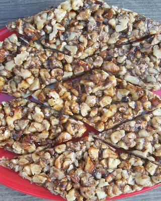 Diamonds of gozinaki, walnuts set in honey