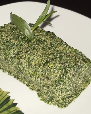 A block of spinach pkhali pounded with walnut