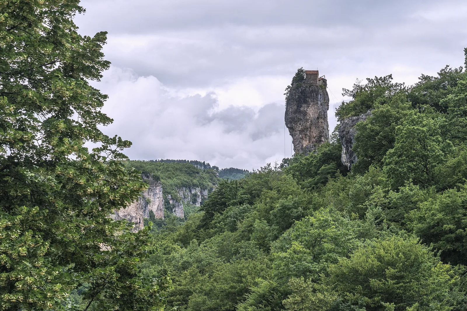 The Katskhi pillar rising out of forest, Imereti