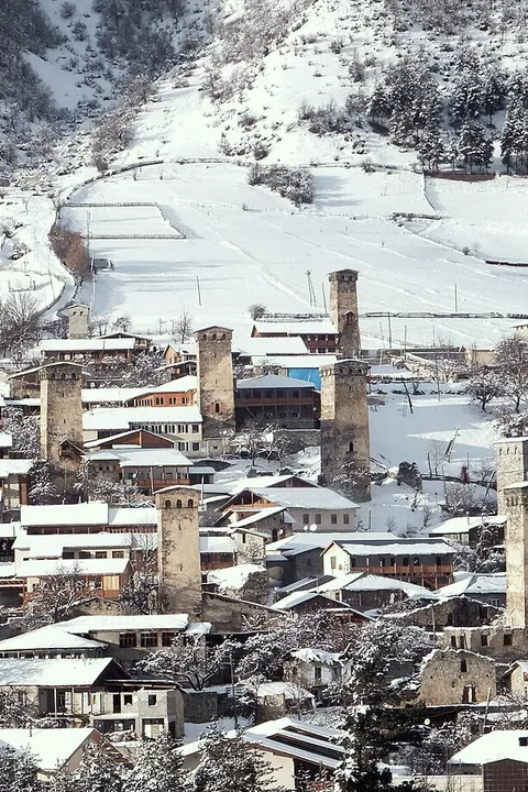 The stone towers of Mestia with snow on every roof