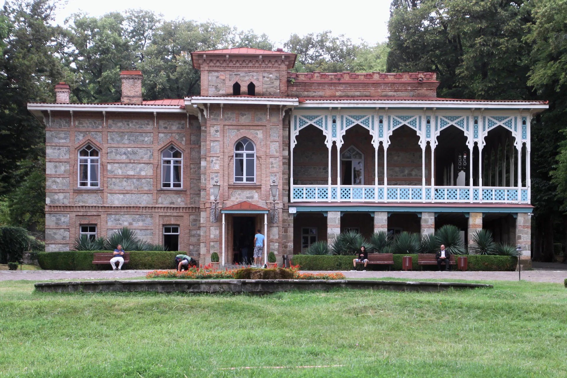 The Chavchavadze palace at Tsinandali with its carved wooden gallery, a lawn in front